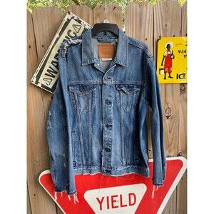 Vintage Y2K Levis denim jacket with a distressed, worn-in look Size XL